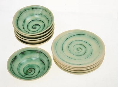 Item #3913 Set of six swirl decorated bowls with underplates. Martin Boyd.