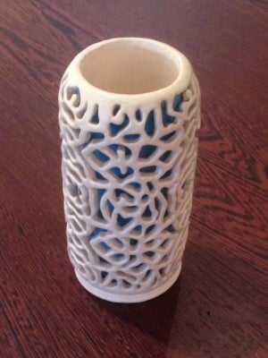 Item #3944 White pierced ceramic vase. Joan Ward.
