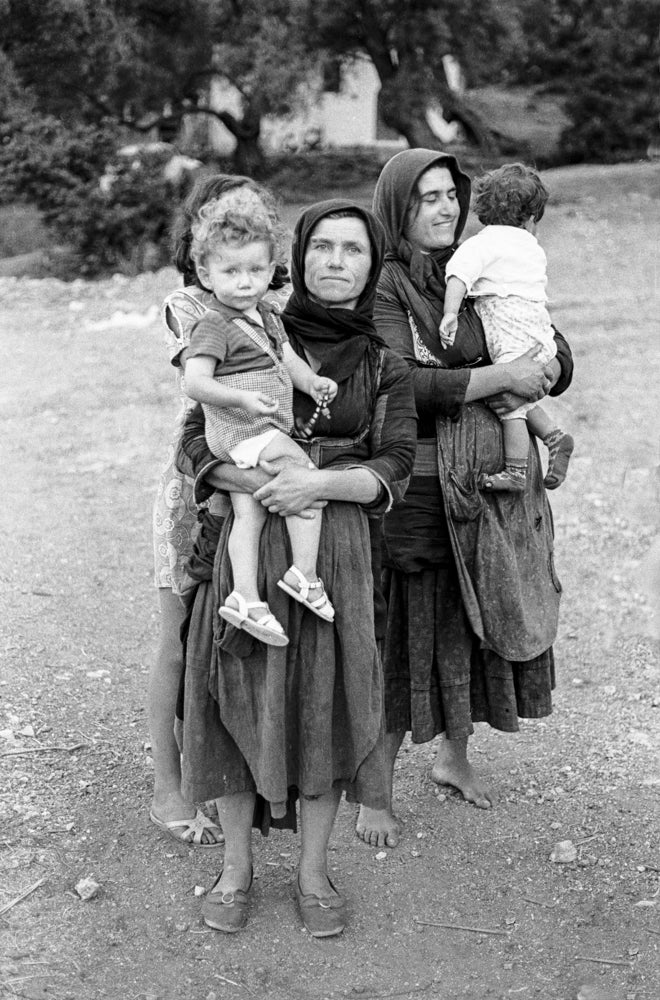 Item #5732 Mothers and Sons, Syvota, Greece 1972. Peter Brown.